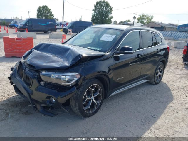 Photo 1 VIN: WBXHU7C39H5H33870 - BMW X1 