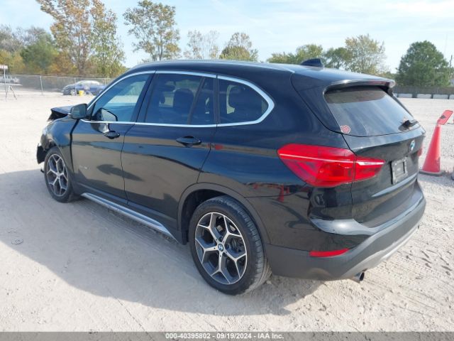 Photo 2 VIN: WBXHU7C39H5H33870 - BMW X1 