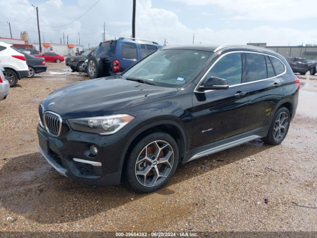 Photo 1 VIN: WBXHU7C39H5H35795 - BMW X1 