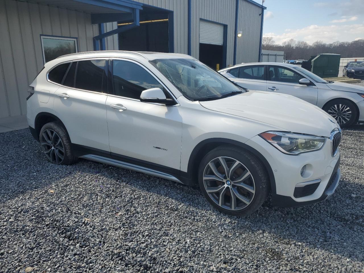 Photo 3 VIN: WBXHU7C39H5H36283 - BMW X1 