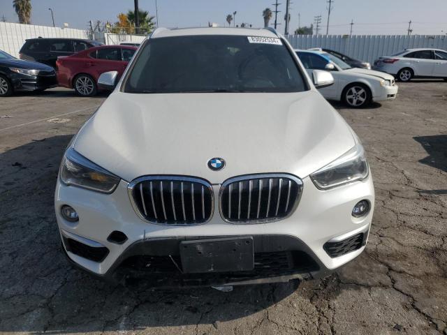 Photo 4 VIN: WBXHU7C39H5H37093 - BMW X1 SDRIVE2 