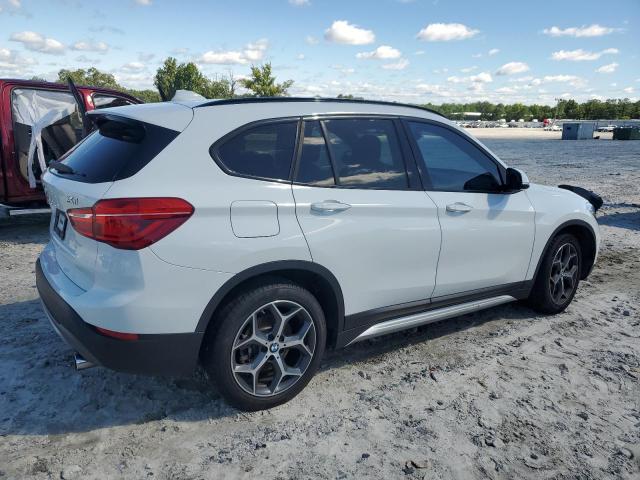 Photo 2 VIN: WBXHU7C39H5H37918 - BMW X1 