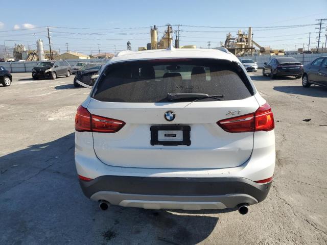 Photo 5 VIN: WBXHU7C39HP924562 - BMW X1 