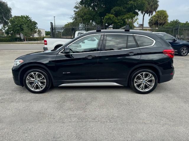 Photo 12 VIN: WBXHU7C39HP924819 - BMW X1 