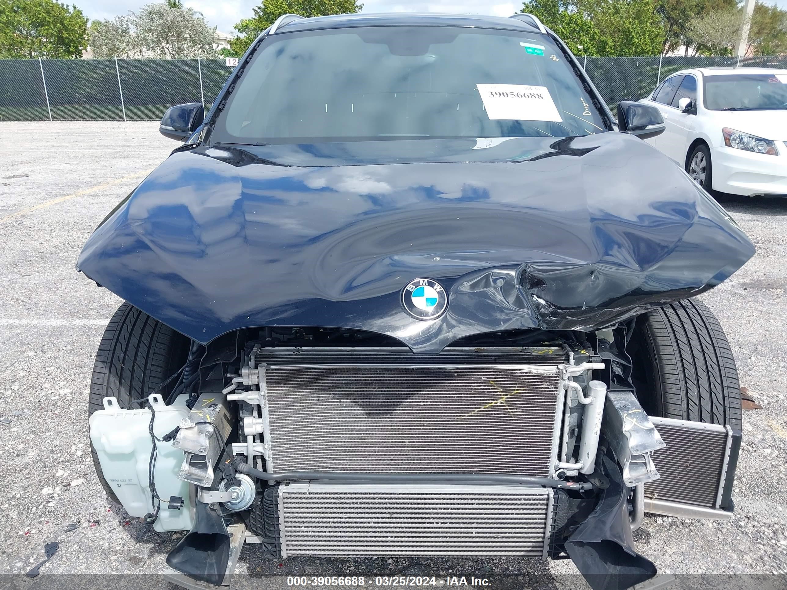 Photo 5 VIN: WBXHU7C39J3H42716 - BMW X1 