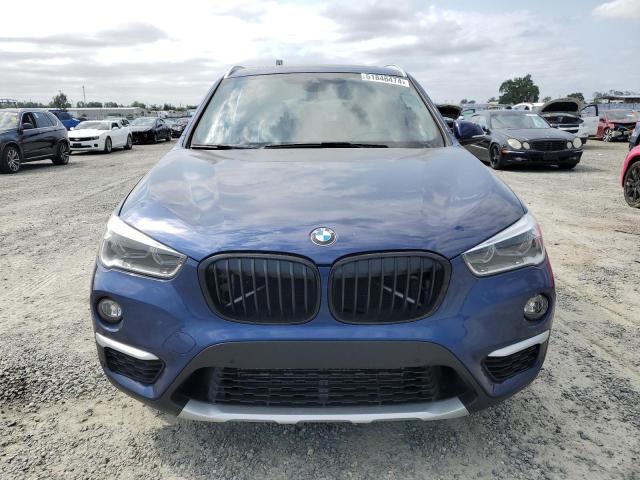 Photo 4 VIN: WBXHU7C39J5H39321 - BMW X1 