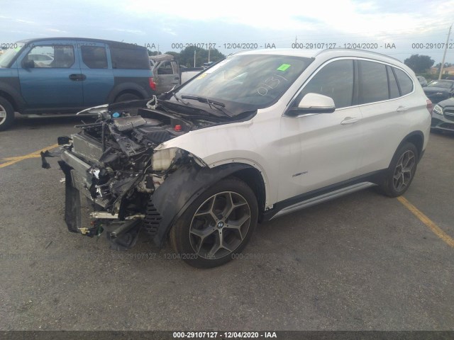 Photo 1 VIN: WBXHU7C39J5H40131 - BMW X1 