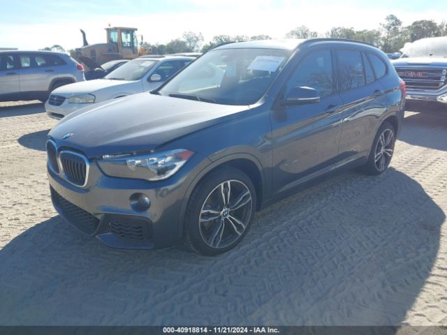 Photo 1 VIN: WBXHU7C39J5H40422 - BMW X1 