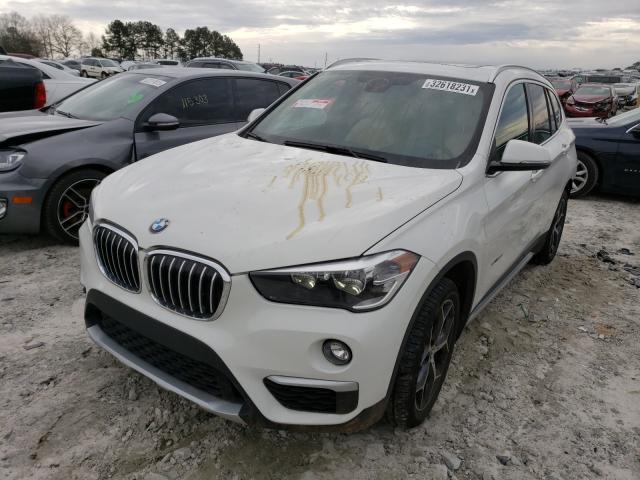 Photo 1 VIN: WBXHU7C39J5H40520 - BMW X1 