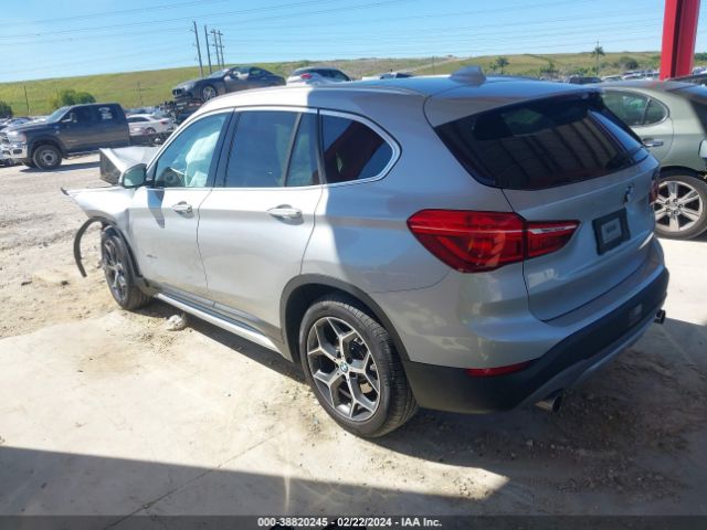 Photo 2 VIN: WBXHU7C39J5H42011 - BMW X1 