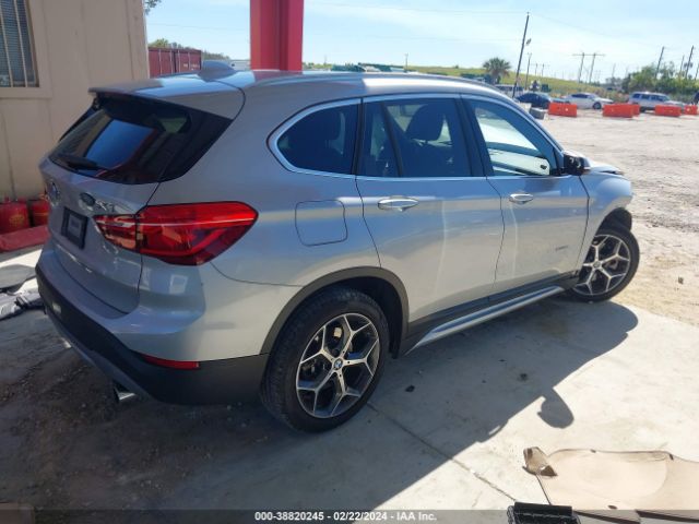 Photo 3 VIN: WBXHU7C39J5H42011 - BMW X1 