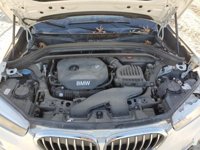 Photo 10 VIN: WBXHU7C39J5H42820 - BMW X1 