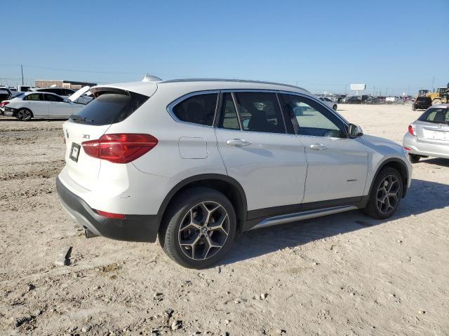 Photo 2 VIN: WBXHU7C39J5H42820 - BMW X1 