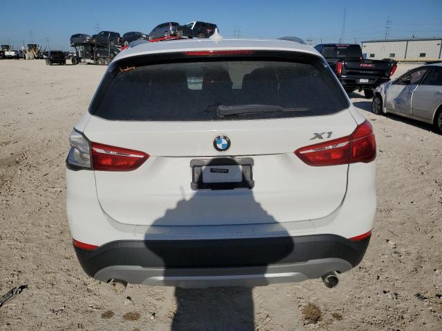 Photo 5 VIN: WBXHU7C39J5H42820 - BMW X1 