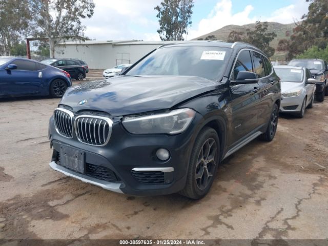 Photo 1 VIN: WBXHU7C39J5H44406 - BMW X1 