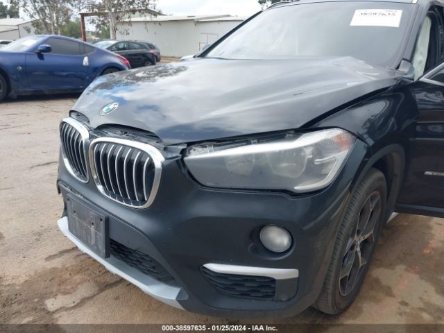 Photo 5 VIN: WBXHU7C39J5H44406 - BMW X1 