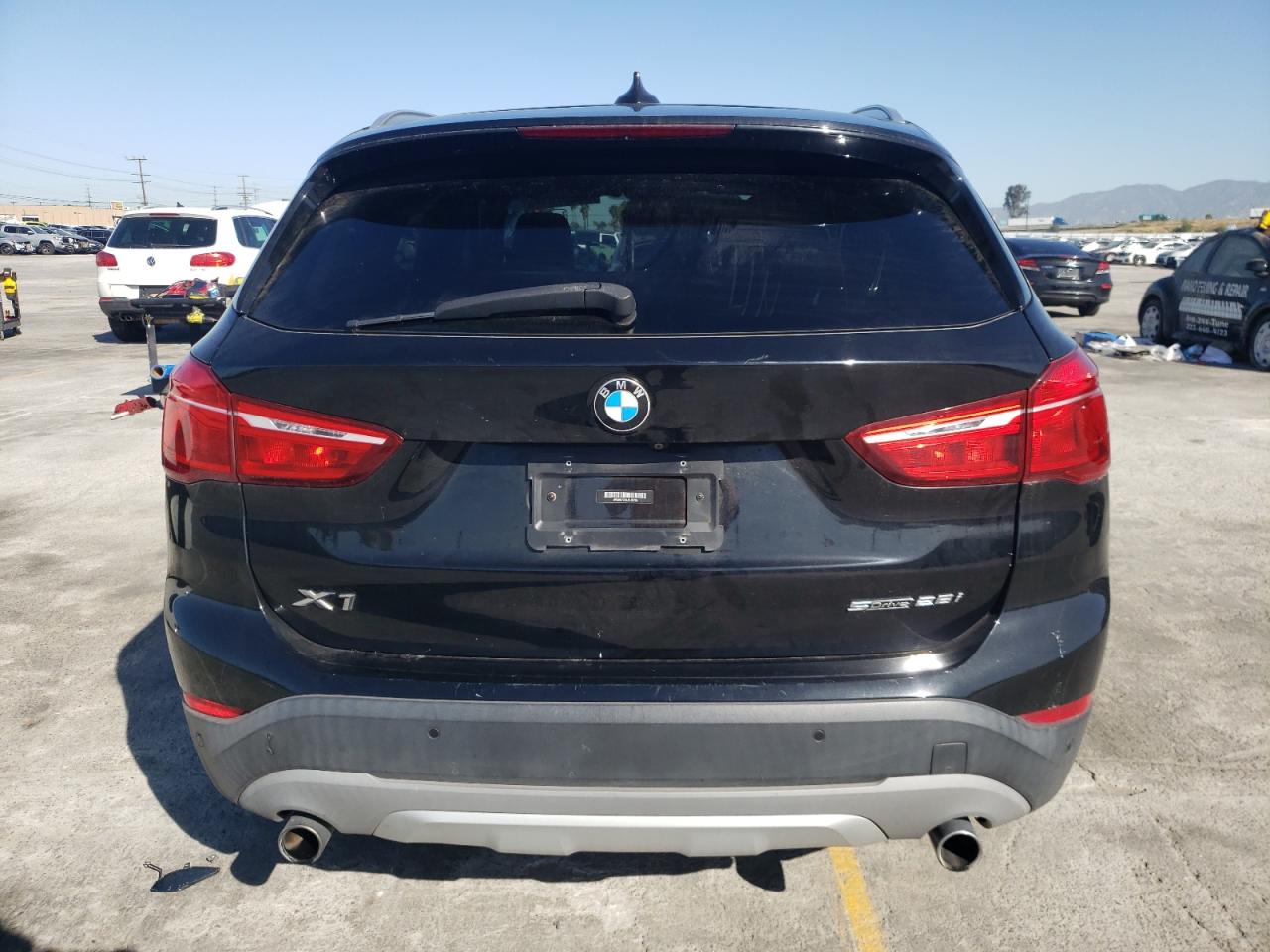 Photo 5 VIN: WBXHU7C39J5L08703 - BMW X1 