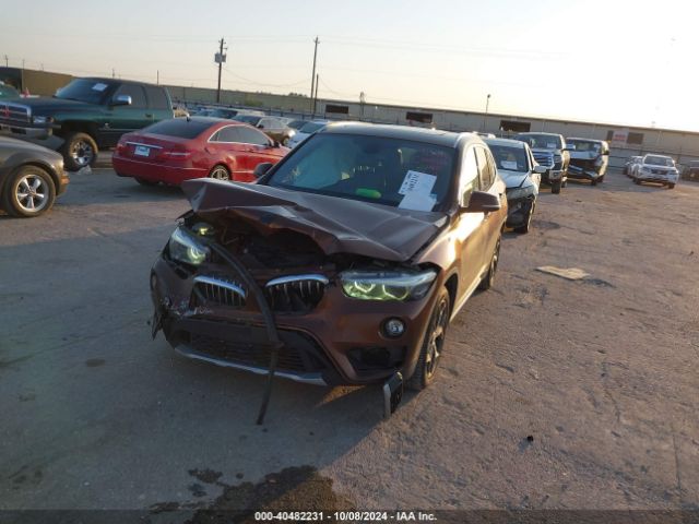 Photo 1 VIN: WBXHU7C3XH5H32856 - BMW X1 