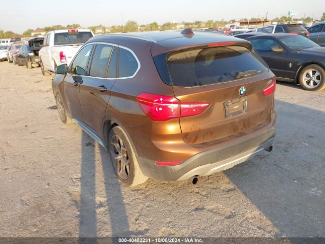 Photo 2 VIN: WBXHU7C3XH5H32856 - BMW X1 