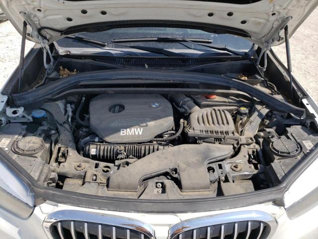 Photo 11 VIN: WBXHU7C3XH5H33862 - BMW X1 