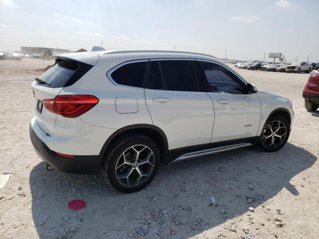 Photo 2 VIN: WBXHU7C3XH5H33862 - BMW X1 