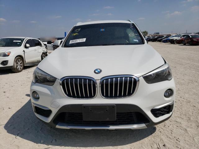 Photo 4 VIN: WBXHU7C3XH5H33862 - BMW X1 