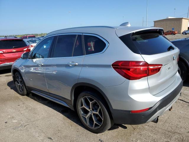 Photo 1 VIN: WBXHU7C3XH5H34039 - BMW X1 SDRIVE2 