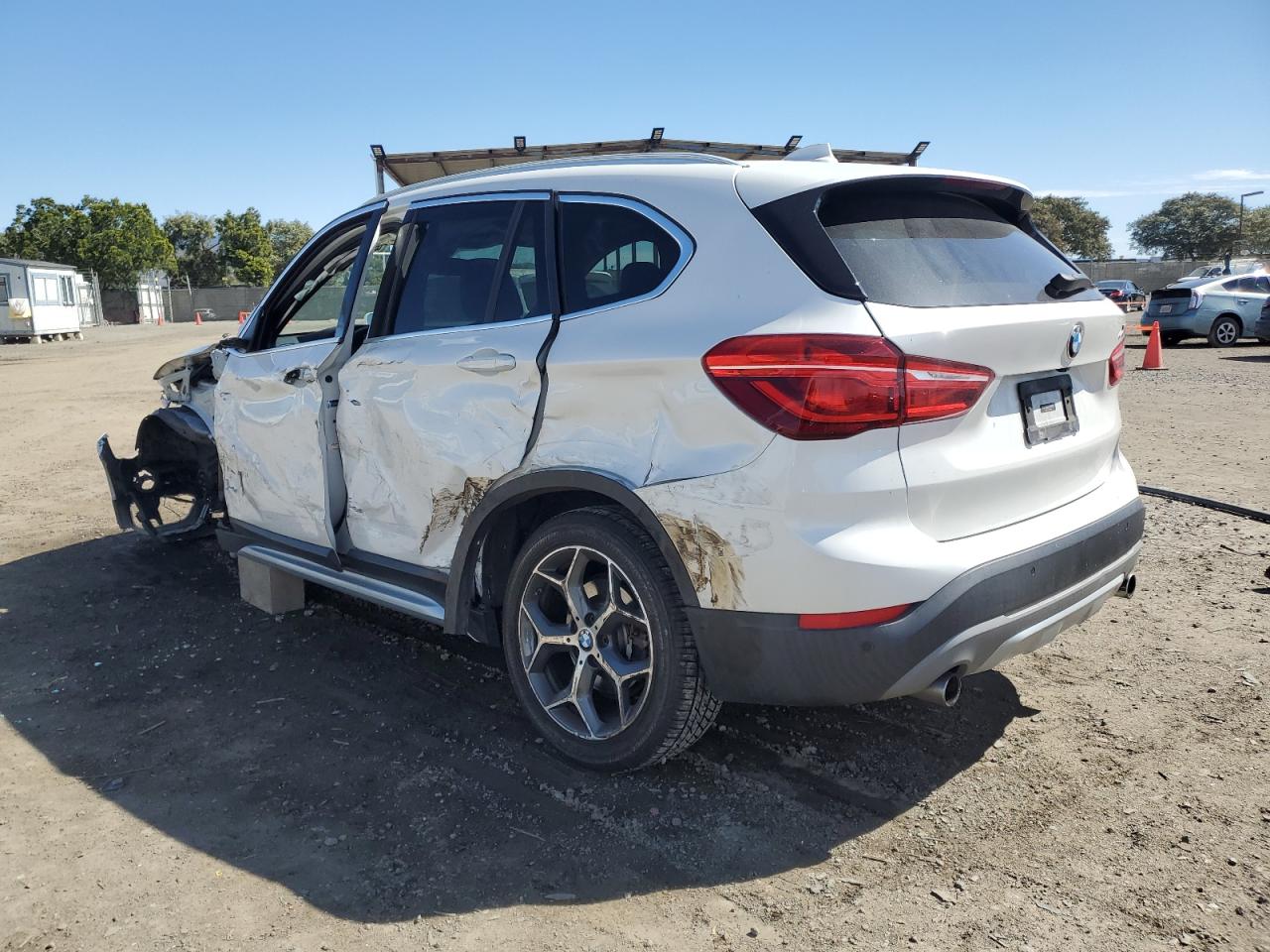 Photo 1 VIN: WBXHU7C3XH5H34185 - BMW X1 