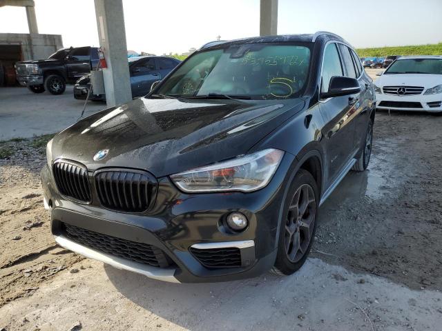 Photo 1 VIN: WBXHU7C3XH5H34803 - BMW X1 