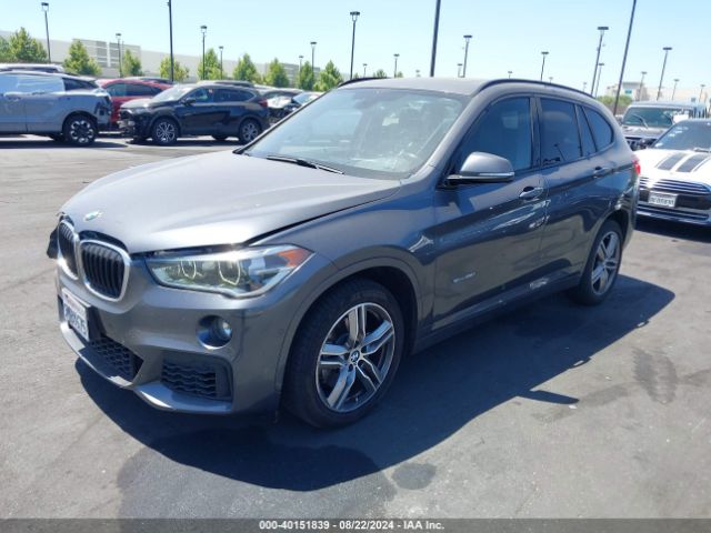 Photo 1 VIN: WBXHU7C3XH5H36700 - BMW X1 