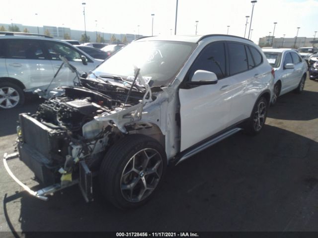 Photo 1 VIN: WBXHU7C3XH5H37720 - BMW X1 