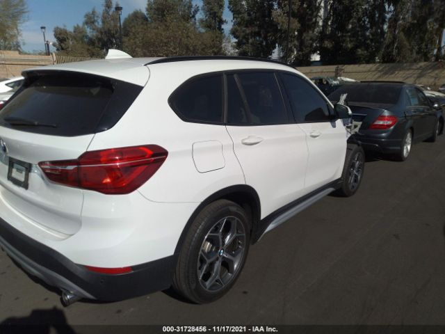 Photo 3 VIN: WBXHU7C3XH5H37720 - BMW X1 