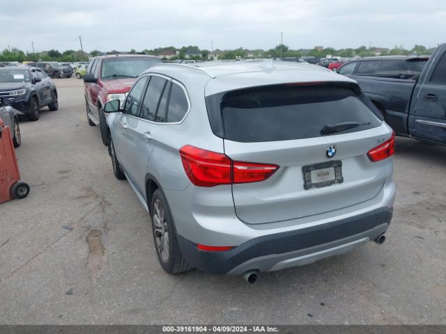 Photo 2 VIN: WBXHU7C3XH5H38141 - BMW X1 