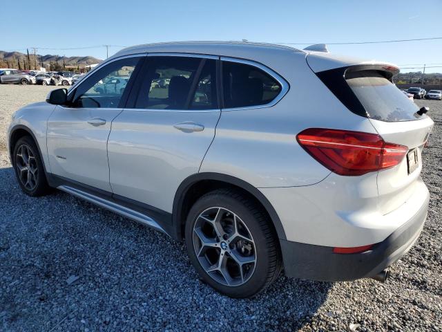 Photo 1 VIN: WBXHU7C3XH5H38625 - BMW X1 