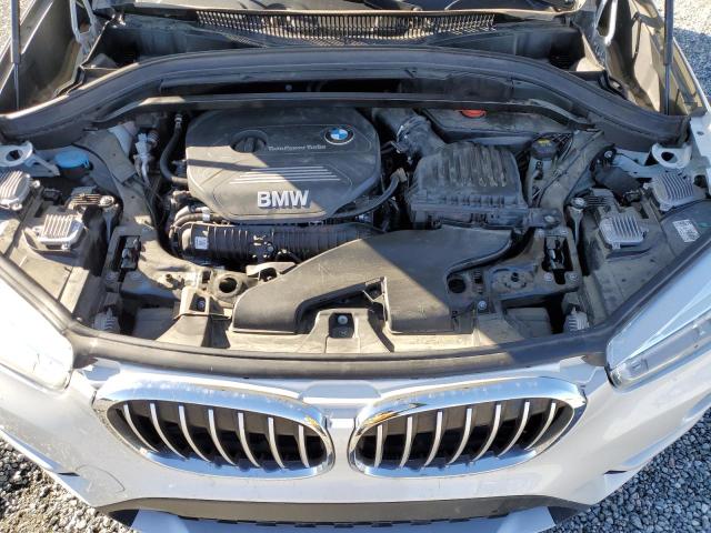 Photo 11 VIN: WBXHU7C3XH5H38625 - BMW X1 