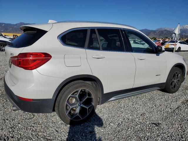 Photo 2 VIN: WBXHU7C3XH5H38625 - BMW X1 