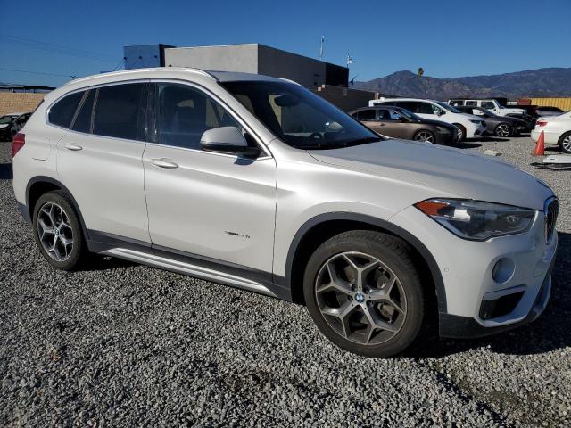 Photo 3 VIN: WBXHU7C3XH5H38625 - BMW X1 