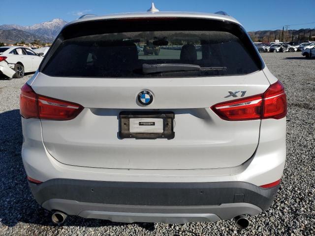 Photo 5 VIN: WBXHU7C3XH5H38625 - BMW X1 