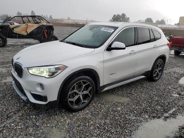 Photo 0 VIN: WBXHU7C3XH5H38625 - BMW X1 