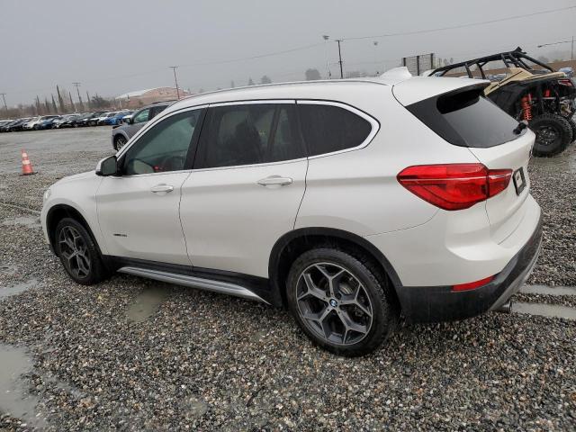 Photo 1 VIN: WBXHU7C3XH5H38625 - BMW X1 