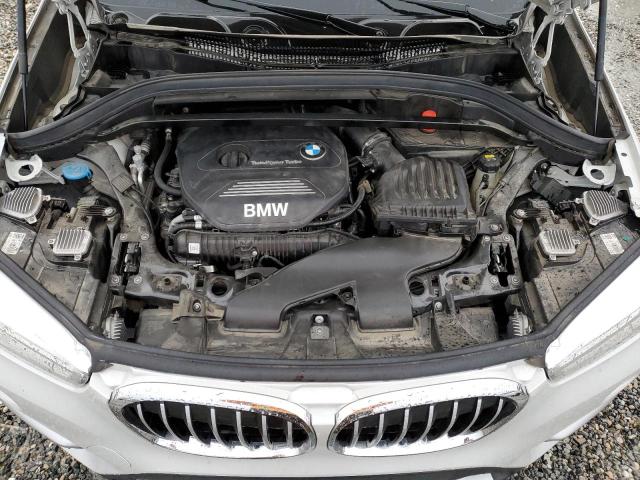 Photo 11 VIN: WBXHU7C3XH5H38625 - BMW X1 