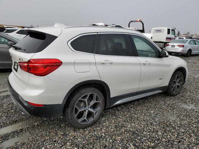 Photo 2 VIN: WBXHU7C3XH5H38625 - BMW X1 