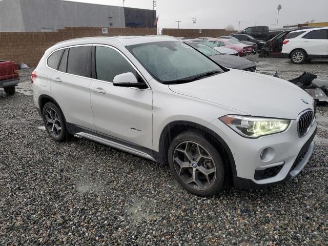 Photo 3 VIN: WBXHU7C3XH5H38625 - BMW X1 