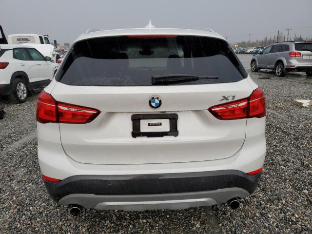 Photo 5 VIN: WBXHU7C3XH5H38625 - BMW X1 