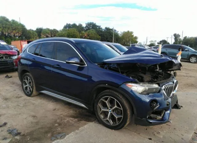 Photo 0 VIN: WBXHU7C3XJ3H42417 - BMW X1 