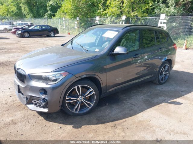 Photo 1 VIN: WBXHU7C3XJ5H38887 - BMW X1 