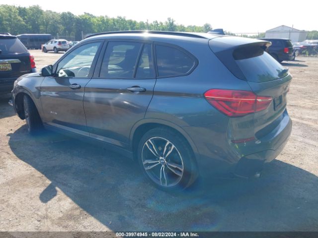 Photo 2 VIN: WBXHU7C3XJ5H38887 - BMW X1 