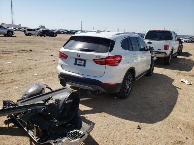 Photo 3 VIN: WBXHU7C3XJ5H39828 - BMW X1 SDRIVE2 