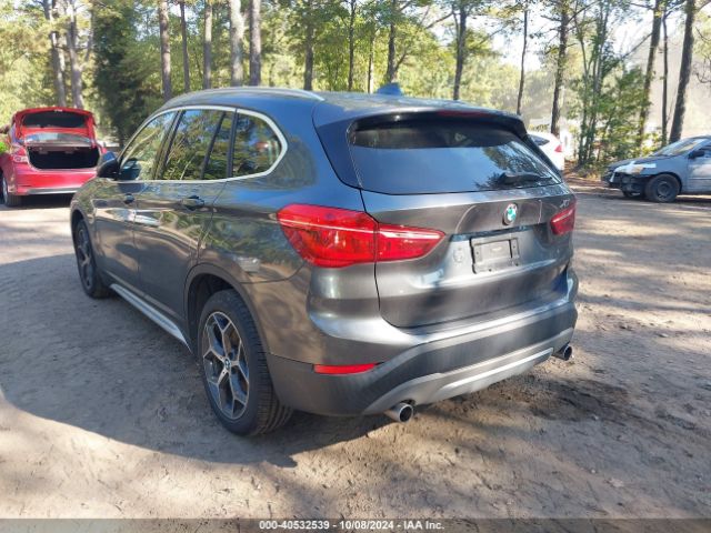 Photo 2 VIN: WBXHU7C3XJ5H40719 - BMW X1 