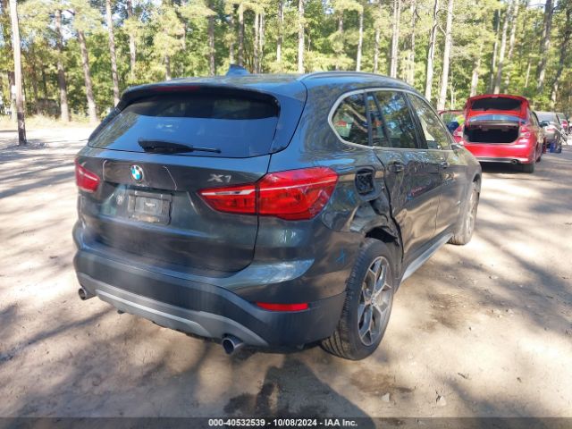 Photo 3 VIN: WBXHU7C3XJ5H40719 - BMW X1 